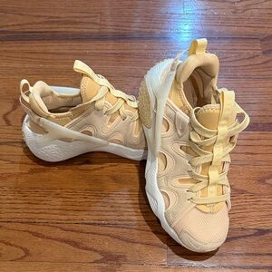 Nike Women’s Athletic Shoes in Beige Yellow